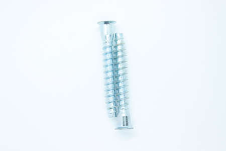 White metal screws located on a white background