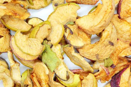 Beautiful dried apples located on whiteの写真素材