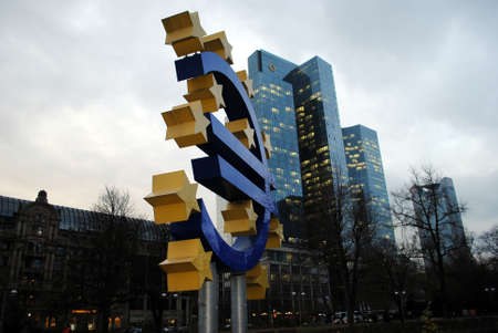 Frankfurt: the big monument of Euro  and skyscrapers in the background