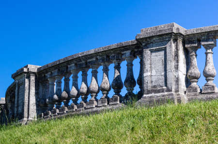 Old fence in sunny day in Peterhof, Saint-Petersburg, Russiaの写真素材