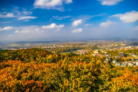 Top view on forest and Carlovy Vary, Czech Republic at autumnの写真素材