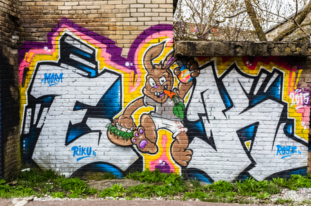 TALLINN, ESTONIA - APRIL 20: Colorful rabbit street art mural on the wall in Tallinn, Estonia at April 20, 2016 in Tallinn, Estoniaのeditorial素材