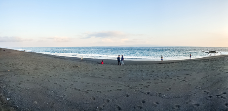 BALI, INDONESIA - SEPTEMBER 18: View on Indian ocean from black sand beach at Septermber 18, 2018 in Bali, Indonesiaのeditorial素材