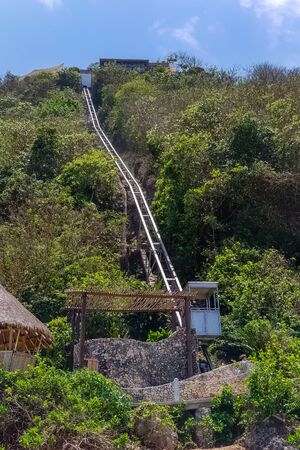 Day view on lift for delivery of tourists on Karma beach on Bali, Indonesia