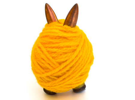 PACIFISM DISARMAMENT - Three bullets wrapped with thread of wool.の写真素材