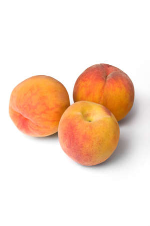 Peaches isolated on white backgroundの写真素材