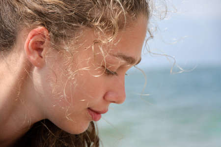 Face of the beautiful girl in profileの写真素材