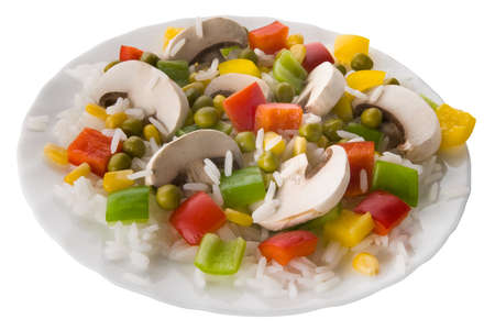 Rice with vegetables and mushrooms on plateの写真素材