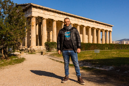Man at Temple of Hephaestus archaeological site in Athens, Greece.の写真素材