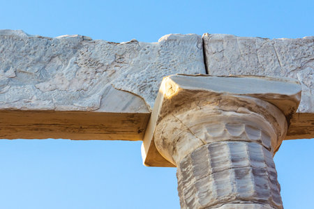 Detail of Doric marble column and entablature at the Temple of Poseidon, Cape Sounion, Greece.