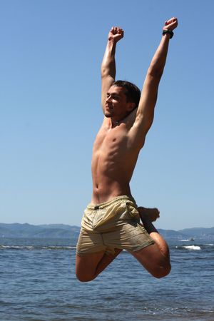 The young man likes the sea.の写真素材