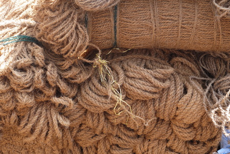 Brooms, ropes, baskets and other household goods from environmentally friendly materials are on sale in flea marketsの写真素材