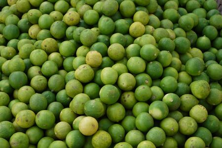 sale of a lime in the grocery market in the Asian countryの写真素材