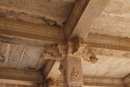 the top part of a column in the Hindu temple of a vidzhayanagarsky era in Hampiの写真素材