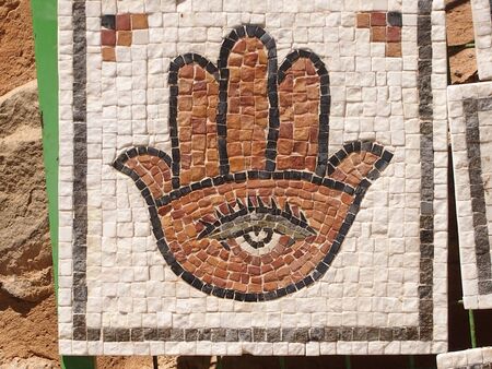 The icon which is laid out from small plitochek - a symbol bringing good luck, happiness and wealthの写真素材