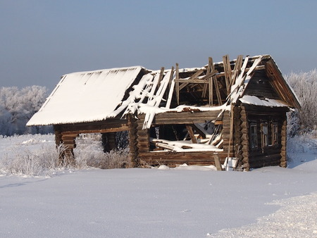 the destroyed house on the suburb of the village left by the ownersの写真素材