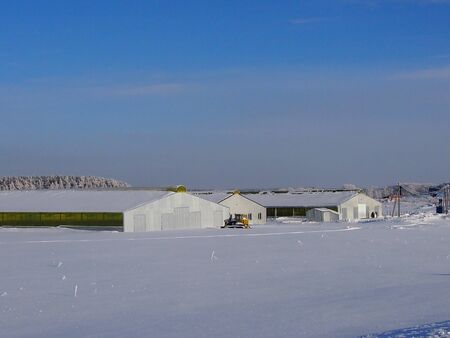 The hangar constructed under storage of agricultural products in the winterの写真素材