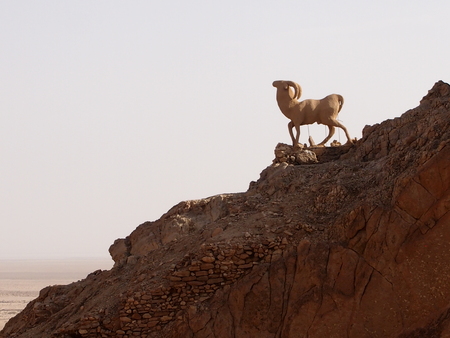 Sculpture of a mountain goat in Satin mountains in North Africaの写真素材