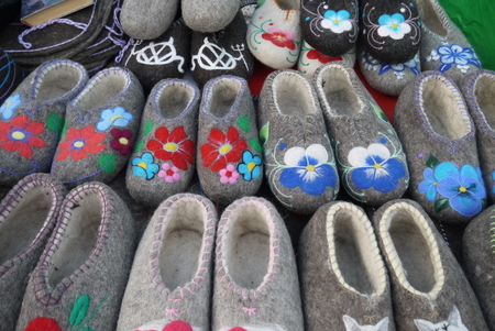 Vinyl footwear from sheep wool for adults and childrenの写真素材