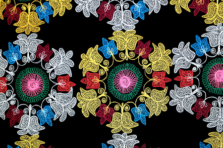 Colorful geometric patterns and flowers on paper and materialの写真素材