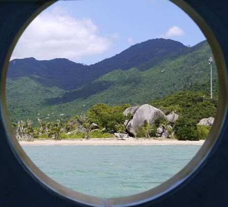 Beautiful round landscape, view through the window from the seaの写真素材