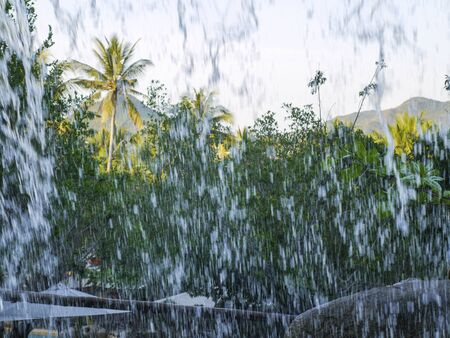Powerful water flows are waterfalls and tropical showersの写真素材