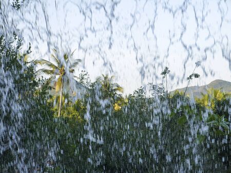 Powerful water flows are waterfalls and tropical showersの写真素材