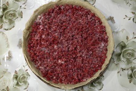 Red berry pie filling filled with sugarの写真素材