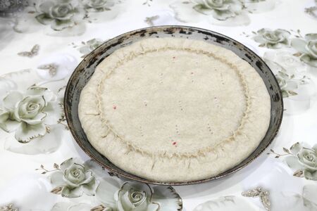 Sweet pie before baking in the ovenの写真素材