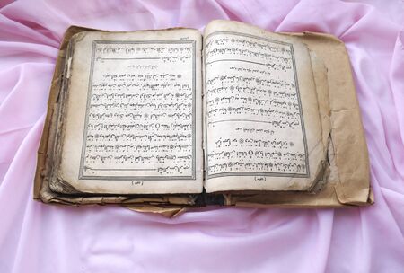 The Quran is an ancient or Islamic bookの写真素材