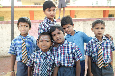 Badami, Karnataka, India - December 14, 2017: Indian schoolchildren and teachers take a tour of ancient temples.のeditorial素材