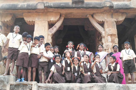 Badami, Karnataka, India - December 14, 2017: Indian schoolchildren and teachers take a tour of ancient temples.のeditorial素材
