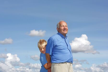 Grandfather and grandson playingの写真素材