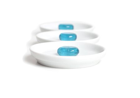 Blue candy on plateの写真素材