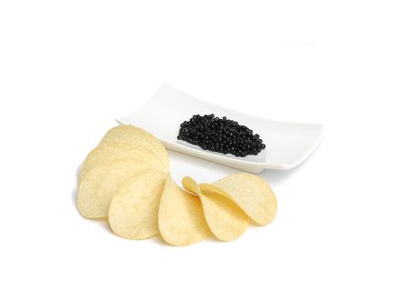 Black caviar and potato chips の写真素材
