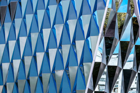 Modern architecture building with mirrors. Sky with clouds on the backgroundのeditorial素材