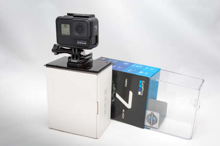 Moscow. November 2018.  GoPro HERO 7 Black in original packaging front and side view. The action...