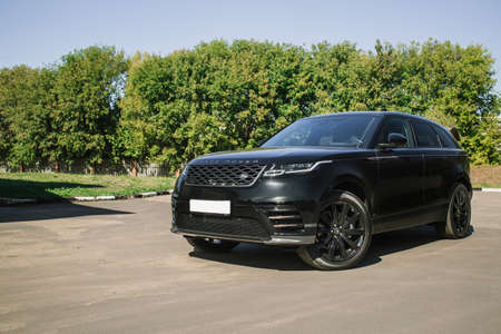 Moscow. Autumn 2018. The Land Rover Range Rover Velar in Black color compact luxury crossover SUV in the industrial zoneのeditorial素材