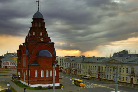 Sunset from hard clouds on background of The Golden Gate in Vladimir city. Famous Tourist place of Gold Ring in Russiaの写真素材
