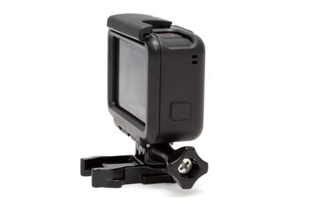 New 4K action camera in black color. Isolated white backgroundの写真素材