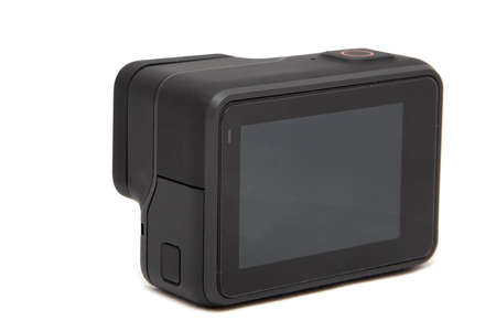 New 4K action camera in black color. Isolated white backgroundの写真素材