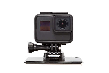 New 4K action camera in black color. Isolated white backgroundの写真素材