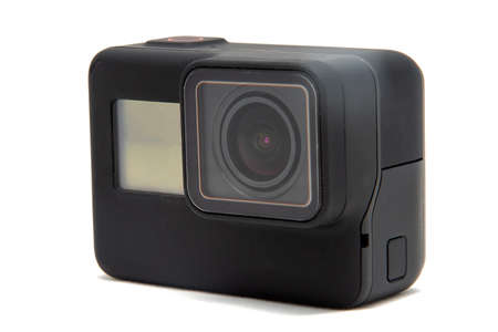 New 4K action camera in black color. Isolated white background.の写真素材