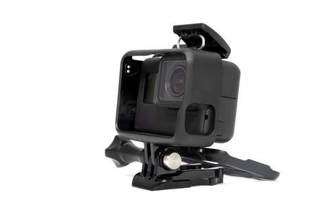 New 4K action camera in black color. Isolated white background.の写真素材