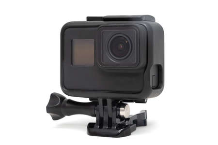 New 4K action camera in black color. Isolated white background.の写真素材