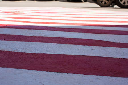 Texture. Red white area on asphalt for special vehicles. Place for fire services and rescuers, emergency.の写真素材