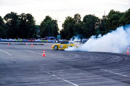 Moscow, Russia - May 25, 2019: Yellow Drift Nissan Silvia. Tuned car drift in the fenced area. Make...