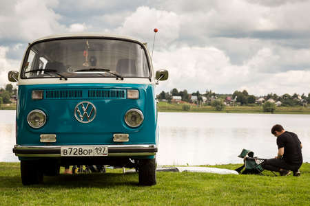 Moscow, Russia - July 13, 2019: Volkswagen T1 transporter restored retro car on the lake. Man...