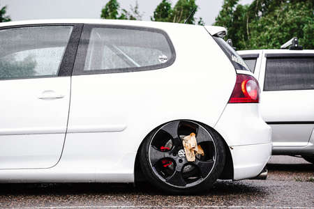 Moscow, Russia: July 06, 2019: Bright white volkswagen golf mk5 on a parking. Tuned Lowered car with...