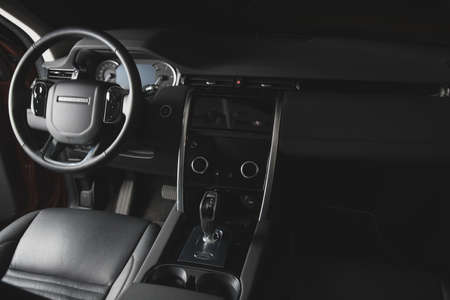Moscow, Russia - December 20, 2019: Black leather Interior of premium england suv. Land rover...